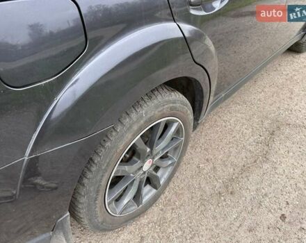 Черный Субару Аутбек, объемом двигателя 2.2 л и пробегом 223 тыс. км за 11000 $, фото 1 на Automoto.ua