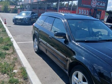 Черный Субару Аутбек, объемом двигателя 3 л и пробегом 260 тыс. км за 7000 $, фото 1 на Automoto.ua