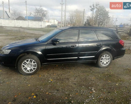 Черный Субару Аутбек, объемом двигателя 2.46 л и пробегом 252 тыс. км за 5650 $, фото 1 на Automoto.ua