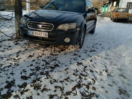 Черный Субару Аутбек, объемом двигателя 2.46 л и пробегом 316 тыс. км за 5600 $, фото 1 на Automoto.ua