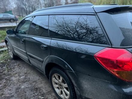 Черный Субару Аутбек, объемом двигателя 3 л и пробегом 308 тыс. км за 5950 $, фото 1 на Automoto.ua