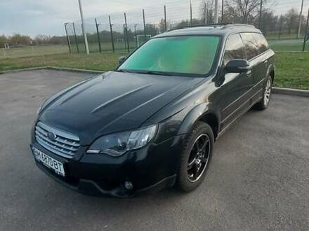 Черный Субару Аутбек, объемом двигателя 3 л и пробегом 325 тыс. км за 8500 $, фото 1 на Automoto.ua