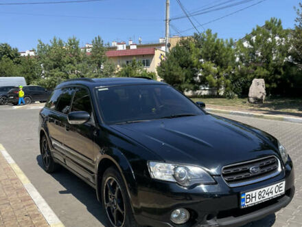 Черный Субару Аутбек, объемом двигателя 2.46 л и пробегом 220 тыс. км за 6800 $, фото 1 на Automoto.ua
