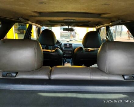 Червоний Субару Аутбек, об'ємом двигуна 2.5 л та пробігом 366 тис. км за 2000 $, фото 14 на Automoto.ua