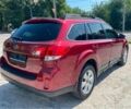 Красный Субару Аутбек, объемом двигателя 2.5 л и пробегом 256 тыс. км за 8999 $, фото 1 на Automoto.ua