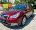 Красный Субару Аутбек, объемом двигателя 2.5 л и пробегом 256 тыс. км за 8999 $, фото 1 на Automoto.ua