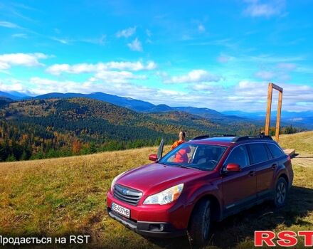 Красный Субару Аутбек, объемом двигателя 2.5 л и пробегом 260 тыс. км за 10500 $, фото 1 на Automoto.ua