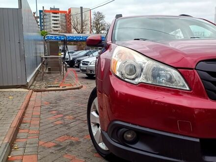 Красный Субару Аутбек, объемом двигателя 2.5 л и пробегом 261 тыс. км за 10500 $, фото 1 на Automoto.ua