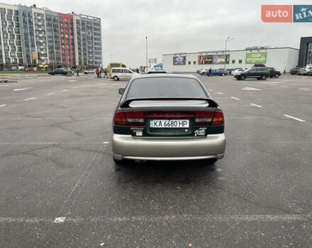 Зеленый Субару Аутбек, объемом двигателя 2.5 л и пробегом 227 тыс. км за 4500 $, фото 4 на Automoto.ua