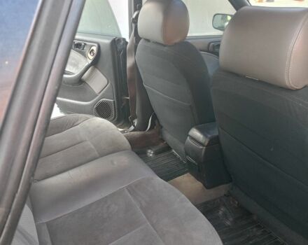 Зеленый Субару Аутбек, объемом двигателя 2.5 л и пробегом 305 тыс. км за 2200 $, фото 4 на Automoto.ua