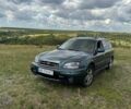 Зелений Субару Аутбек, об'ємом двигуна 3 л та пробігом 400 тис. км за 5500 $, фото 1 на Automoto.ua