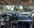 Белый Субару Crosstrek, объемом двигателя 2 л и пробегом 210 тыс. км за 12500 $, фото 4 на Automoto.ua