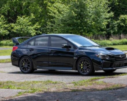 Черный Субару Impreza WRX, объемом двигателя 2.5 л и пробегом 56 тыс. км за 12000 $, фото 1 на Automoto.ua