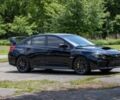 Черный Субару Impreza WRX, объемом двигателя 2.5 л и пробегом 56 тыс. км за 12000 $, фото 1 на Automoto.ua