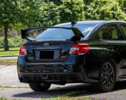 Черный Субару Impreza WRX, объемом двигателя 2.5 л и пробегом 56 тыс. км за 12000 $, фото 2 на Automoto.ua