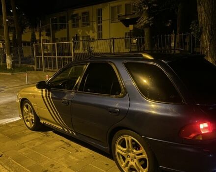 Синий Субару Impreza WRX, объемом двигателя 2 л и пробегом 220 тыс. км за 4700 $, фото 5 на Automoto.ua