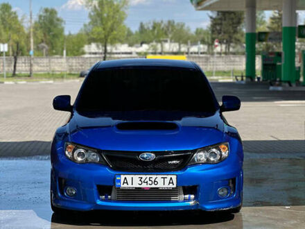 Синий Субару Impreza WRX, объемом двигателя 2.46 л и пробегом 153 тыс. км за 11500 $, фото 1 на Automoto.ua