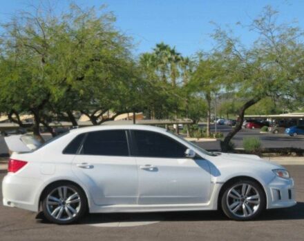 Белый Субару Импреза ВРХ СТИ, объемом двигателя 2.5 л и пробегом 81 тыс. км за 7600 $, фото 2 на Automoto.ua