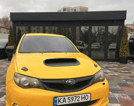 Желтый Субару Импреза ВРХ СТИ, объемом двигателя 2 л и пробегом 118 тыс. км за 7000 $, фото 1 на Automoto.ua