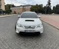 Белый Субару Impreza XV, объемом двигателя 2 л и пробегом 240 тыс. км за 9999 $, фото 1 на Automoto.ua