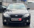 Черный Субару Legacy Outback, объемом двигателя 25 л и пробегом 271 тыс. км за 6590 $, фото 1 на Automoto.ua