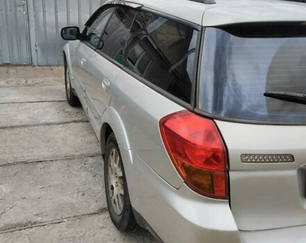 Серый Субару Legacy Outback, объемом двигателя 2.5 л и пробегом 227 тыс. км за 6450 $, фото 4 на Automoto.ua