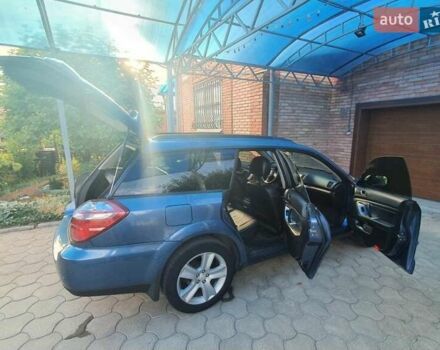 Синий Субару Legacy Outback, объемом двигателя 2.5 л и пробегом 327 тыс. км за 7000 $, фото 5 на Automoto.ua