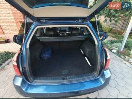 Синій Субару Legacy Outback, об'ємом двигуна 2.5 л та пробігом 327 тис. км за 7000 $, фото 1 на Automoto.ua