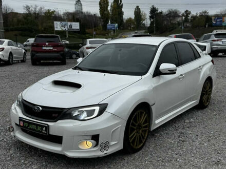 Субару WRX STI 2014 в Белой Церкве на Automoto.ua Белый Субару WRX STI, объемом двигателя 2.46 л и пробегом 68 тыс. км за 18500 $, фото 1 на Automoto.ua