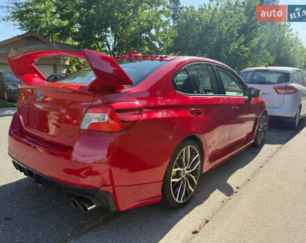 Красный Субару WRX STI, объемом двигателя 2.5 л и пробегом 110 тыс. км за 30000 $, фото 6 на Automoto.ua