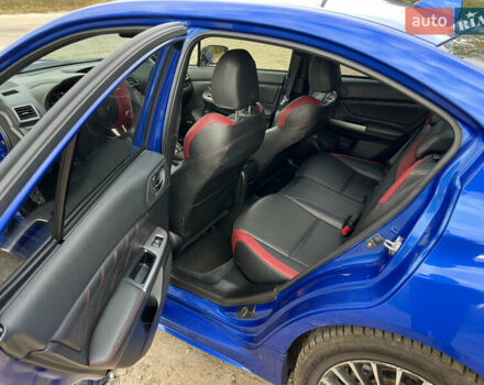 Синий Субару WRX STI, объемом двигателя 2.46 л и пробегом 127 тыс. км за 25000 $, фото 7 на Automoto.ua