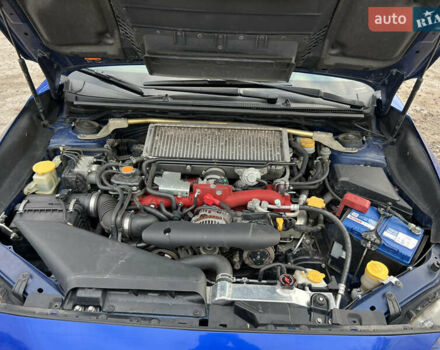 Синий Субару WRX STI, объемом двигателя 2.46 л и пробегом 127 тыс. км за 25000 $, фото 9 на Automoto.ua