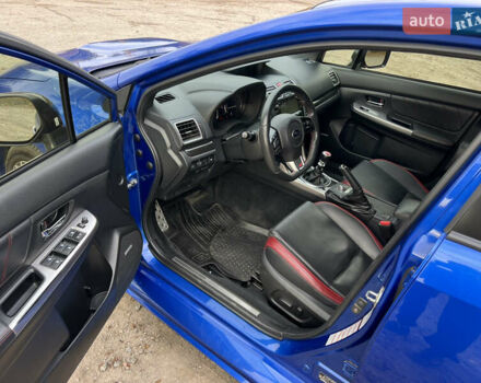 Синий Субару WRX STI, объемом двигателя 2.46 л и пробегом 127 тыс. км за 25000 $, фото 8 на Automoto.ua