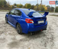 Синий Субару WRX STI, объемом двигателя 2.46 л и пробегом 127 тыс. км за 25000 $, фото 5 на Automoto.ua