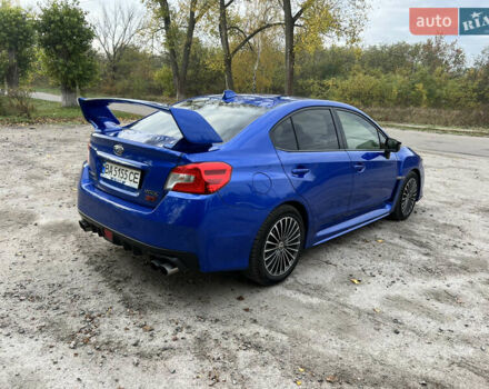 Синий Субару WRX STI, объемом двигателя 2.46 л и пробегом 127 тыс. км за 25000 $, фото 4 на Automoto.ua