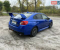 Синий Субару WRX STI, объемом двигателя 2.46 л и пробегом 127 тыс. км за 25000 $, фото 4 на Automoto.ua