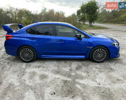 Синий Субару WRX STI, объемом двигателя 2.46 л и пробегом 127 тыс. км за 25000 $, фото 3 на Automoto.ua