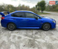 Синий Субару WRX STI, объемом двигателя 2.46 л и пробегом 127 тыс. км за 25000 $, фото 3 на Automoto.ua