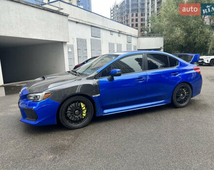 Синий Субару WRX STI, объемом двигателя 2.46 л и пробегом 37 тыс. км за 27000 $, фото 5 на Automoto.ua