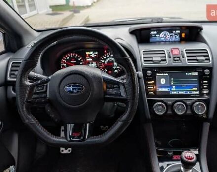 Синий Субару WRX STI, объемом двигателя 2.5 л и пробегом 129 тыс. км за 26500 $, фото 40 на Automoto.ua