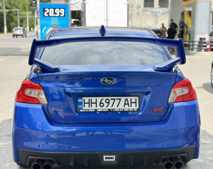 Синий Субару WRX STI, объемом двигателя 2.46 л и пробегом 112 тыс. км за 29500 $, фото 4 на Automoto.ua
