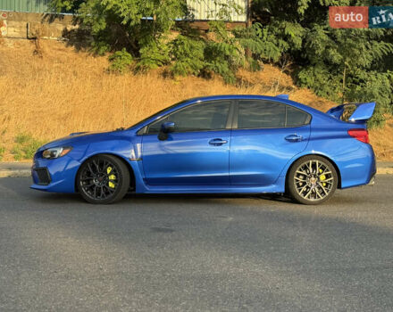 Синий Субару WRX STI, объемом двигателя 2.46 л и пробегом 112 тыс. км за 29500 $, фото 2 на Automoto.ua