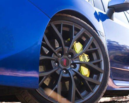Синий Субару WRX STI, объемом двигателя 2.46 л и пробегом 112 тыс. км за 29500 $, фото 13 на Automoto.ua