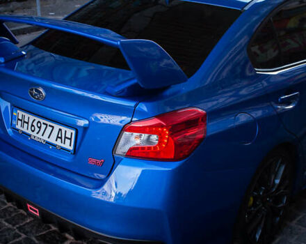 Синий Субару WRX STI, объемом двигателя 2.46 л и пробегом 112 тыс. км за 29500 $, фото 11 на Automoto.ua