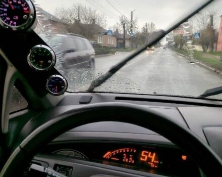 Черный Сузуки Аэрио, объемом двигателя 2 л и пробегом 250 тыс. км за 1690 $, фото 1 на Automoto.ua