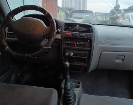 Червоний Сузукі Альто, об'ємом двигуна 1 л та пробігом 133 тис. км за 2650 $, фото 6 на Automoto.ua