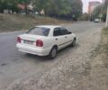 Белый Сузуки Балеро, объемом двигателя 1.3 л и пробегом 400 тыс. км за 1698 $, фото 1 на Automoto.ua