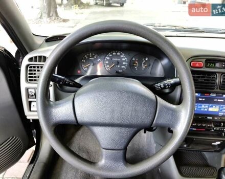 Черный Сузуки Балеро, объемом двигателя 1.3 л и пробегом 332 тыс. км за 2800 $, фото 3 на Automoto.ua