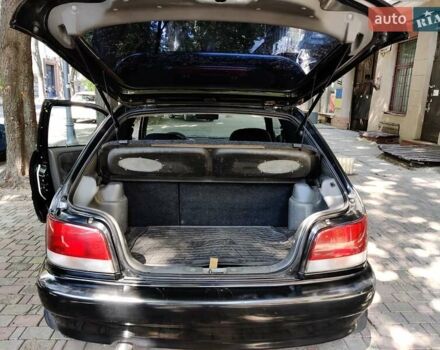 Черный Сузуки Балеро, объемом двигателя 1.3 л и пробегом 332 тыс. км за 2800 $, фото 8 на Automoto.ua