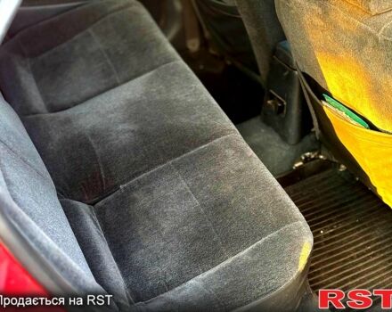 Красный Сузуки Балеро, объемом двигателя 1.6 л и пробегом 200 тыс. км за 2100 $, фото 6 на Automoto.ua